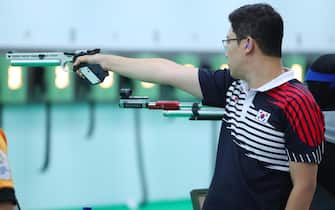 epa06954006 South Korean shooter Jin Jong-oh trains at Jakabaring Sport City Shooting Range in Jakarta, Indonesia, 17 August 2018. The Asian Games will take place from 18 August until 02 September 2018 in Jakarta and Palembang.  EPA/YONHAP SOUTH KOREA OUT
