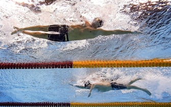 epa05482884 Gregorio Patrinieri of Italy (top) and Connor Jaeger of USA compete in the men's 1500m Freestyle Final race of the Rio 2016 Olympic Games Swimming events at Olympic Aquatics Stadium at the Olympic Park in Rio de Janeiro, Brazil, 14 August 2016.  EPA/PATRICK B. KRAEMER