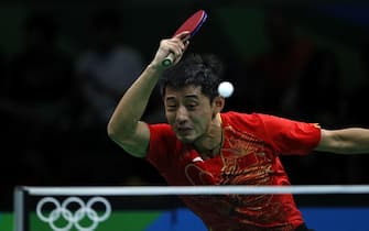 (160808) -- RIO DE JANEIRO, Aug. 8, 2016 (Xinhua) -- Zhang Jike of China competes during the men's single round 3 of table tennis against Chen Chien-An of Chinese Taipei at the 2016 Rio Olympic Games in Rio de Janeiro, Brazil, on Aug. 8, 2016. Zhang Jike won with 4:0. (Xinhua/Shen Bohan)(dh)//CHINENOUVELLE_1037.0083/Credit:CHINE NOUVELLE/SIPA/1608091149