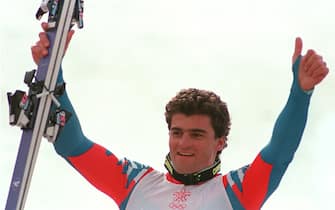 Italian skier Alberto Tomba gives the thumbs up after winning the men's giant slalom 25 February 1988 in Nakiska at the Calgary Winter Olympic Games. Two days later, Tomba won the gold medal in the slalom. AFP PHOTO (Photo credit should read STAFF/AFP via Getty Images)