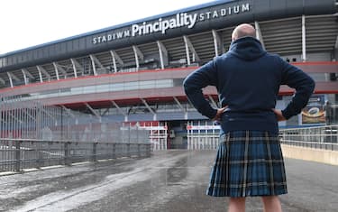 CARDIFF, WALES - MARCH 14: A Scotland fan in a kilt is pictured outside a deserted Principality Stadium after the 2020 Guinness Six Nations match between Wales and Scotland at Principality Stadium was cancelled the day before due to Coronavirus (Covid-19) on March 14, 2020 in Cardiff, Wales. (Photo by Stu Forster/Getty Images)