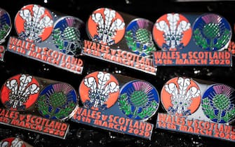 CARDIFF, UNITED KINGDOM - MARCH 14: Wales and Scotland rugby badges on sale on March 14, 2020 in Cardiff, Wales. The Six Nations fixture in Cardiff was postponed 24 hours before kick-off due to concerns about the spread of the coronavirus. (Photo by Matthew Horwood/Getty Images)