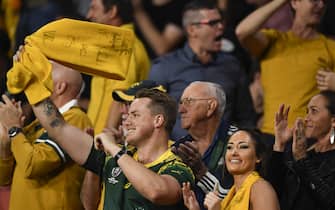 BRISBANE, AUSTRALIA - NOVEMBER 07: Wallabies fans celebrate during the 2020 Tri-Nations match between the Australian Wallabies and the New Zealand All Blacks at Suncorp Stadium on November 07, 2020 in Brisbane, Australia. (Photo by Albert Perez/Getty Images)