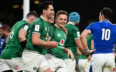 Dublin , Ireland - 27 February 2022; Michael Lowry of Ireland, centre, celebrates after scoring his side's third try with teammates Joey Carbery during the Guinness Six Nations Rugby Championship match between Ireland and Italy at the Aviva Stadium in Dublin. (Photo By Harry Murphy/Sportsfile via Getty Images)