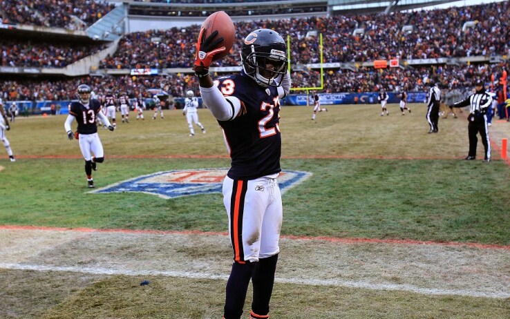 Devin Hester celebra uno dei suoi 20 TD su ritorno Devin Hester celebra uno dei suoi 20 TD su ritorno