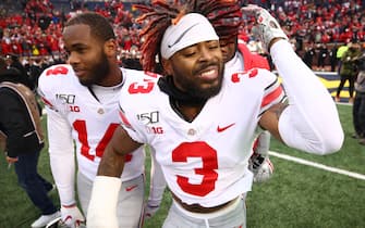 ANN ARBOR, MICHIGAN - NOVEMBER 30: Damon Arnette #3 of the Ohio State Buckeyes celebrates a 56-27 win over the Michigan Wolverines with K.J. Hill #14 of the Ohio State Buckeyes at Michigan Stadium on November 30, 2019 in Ann Arbor, Michigan. (Photo by Gregory Shamus/Getty Images)