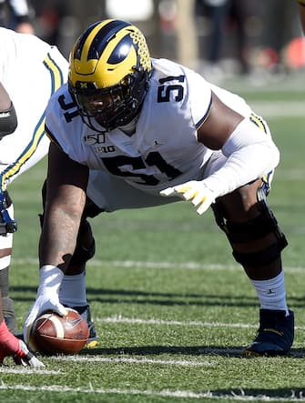 COLLEGE PARK, MD - NOVEMBER 02:  Cesar Ruiz #51 of the Michigan Wolverines gets readt to snap the ball against the Maryland Terrapins on November 2, 2019 in College Park, Maryland.  (Photo by G Fiume/Maryland Terrapins/Getty Images)