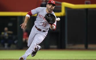 PHOENIX, ARIZONA - SEPTEMBER 14: Joey Votto #19 of the Cincinnati Reds fields a ground ball in the first inning of the MLB game against the Arizona Diamondbacks at Chase Field on September 14, 2019 in Phoenix, Arizona. (Photo by Jennifer Stewart/Getty Images)