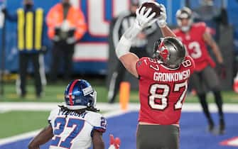 Nov 2, 2020; East Rutherford, New Jersey, USA; Tampa Bay Buccaneers tight end Rob Gronkowski (87) catches a touchdown pass in front of New York Giants cornerback Isaac Yiadom (27) during the second half at MetLife Stadium. Mandatory Credit: Vincent Carchietta-USA TODAY Sports/Sipa USA
