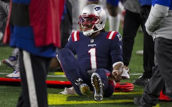 epa08908663  New England Patriots quarterback Cam Newton reacts after being pushed out of bounds by the Buffalo Bills in the first half of their NFL game at Gillette Stadium in Foxborough, Massachusetts, USA, 28 December 2020.  EPA/CJ GUNTHER