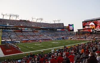 Feb 7, 2021; Tampa, FL, USA; The Tampa Bay Buccaneers and Kansas City Chiefs stand for a video presentation before Super Bowl LV at Raymond James Stadium.  Mandatory Credit: Kim Klement-USA TODAY Sports/Sipa USA