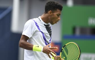 SHANGHAI, CHINA - OCTOBER 09: Felix Auger-Aliassime of Canada in action against Stefanos Tsitsipas of Greece on day five of 2019 Rolex Shanghai Masters at Qi Zhong Tennis Centre at Qi Zhong Tennis Centre on October 9, 2019 in Shanghai, China. ((Photo by Fred Lee/Getty Images)