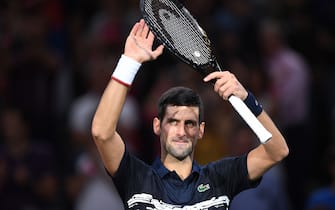 Serbia's Novak Djokovic celebrates after winning against Britain's Kyle Edmund during their men's singles tennis match on day four of the ATP World Tour Masters 1000 - Rolex Paris Masters - indoor tennis tournament at The AccorHotels Arena in Paris on October 31, 2019. (Photo by Christophe ARCHAMBAULT / AFP) (Photo by CHRISTOPHE ARCHAMBAULT/AFP via Getty Images)