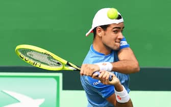 Italy's Matteo Berrettini plays a shot against India's Prajnesh Gunneswaran during their men's singles match in the Davis Cup 2019 tennis qualifier between India and Italy at the Calcutta South Club in Kolkata on February 1, 2019. (Photo by Dibyangshu SARKAR / AFP)        (Photo credit should read DIBYANGSHU SARKAR/AFP via Getty Images)