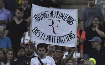 BUENOS AIRES, ARGENTINA - NOVEMBER 20: A fan of Roger Federer of Switzerland shows a sign in stands during an exhibition game between Alexander Zverev and Roger Federer at Arena Parque Roca on November 20, 2019 in Buenos Aires, Argentina. (Photo by Marcelo Endelli/Getty Images)
