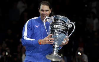 LONDON, ENGLAND - NOVEMBER 15:  Rafael Nadal of Spain poses with his trophy after being announced as ATP Tour end of year world number one following his singles match against Stefanos Tsitsipas of Greece during Day Six of the Nitto ATP World Tour Finals at The O2 Arena on November 15, 2019 in London, England. (Photo by Julian Finney/Getty Images)