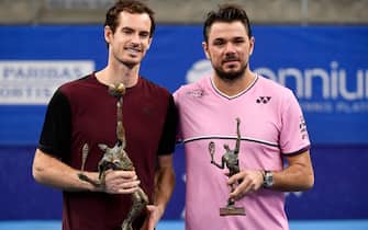 Winner Britain's Andy Murray (L) and second-placed Switzerland's Stanislas Wawrinka (R) celebrate with their trophies after competing in their men's single tennis final match of the European Open ATP Antwerp, on October 20, 2019 in Antwerp. (Photo by JOHN THYS / BELGA / AFP) / Belgium OUT (Photo by JOHN THYS/BELGA/AFP via Getty Images)