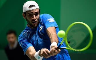 Italy's Matteo Berrettini returns the ball against US Taylor Fritz during their singles tennis match at the Davis Cup Madrid Finals 2019 in Madrid on November 20, 2019. (Photo by JAVIER SORIANO / AFP) (Photo by JAVIER SORIANO/AFP via Getty Images)