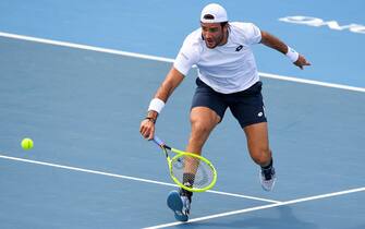 1193817457 Matteo Berrettini of Italy hits a return in his match against Marc Polmans of Australia at the Kooyong Classic tennis tournament in Melbourne on January 15, 2020. (Photo by William WEST / AFP) / --IMAGE RESTRICTED TO EDITORIAL USE - NO COMMERCIAL USE-- (Photo by WILLIAM WEST/AFP via Getty Images)