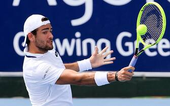 1193817421 Matteo Berrettini of Italy hits a return in his match against Marc Polmans of Australia at the Kooyong Classic tennis tournament in Melbourne on January 15, 2020. (Photo by William WEST / AFP) / --IMAGE RESTRICTED TO EDITORIAL USE - NO COMMERCIAL USE-- (Photo by WILLIAM WEST/AFP via Getty Images)