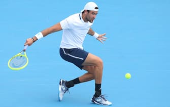 1199568510 MELBOURNE, AUSTRALIA - JANUARY 15: Matteo Berrettini of Italy plays a backhand in his Men s Singles match against Marc Polmans of Australia during day two of the 2020 Kooyong Classic at Kooyong on January 15, 2020 in Melbourne, Australia. (Photo by Mike Owen/Getty Images)