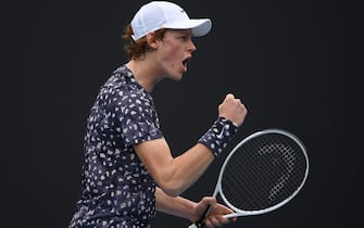 MELBOURNE, AUSTRALIA - JANUARY 20: Jannik Sinner of Italy celebrates after winning a point during his Men's Singles first round match against Max Purcell of Australia on day one of the 2020 Australian Open at Melbourne Park on January 20, 2020 in Melbourne, Australia. (Photo by Hannah Peters/Getty Images)