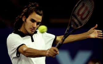 22 Feb 2000:  Roger Federer of Switzerland plays a backhand during the AXA Cup 2000 at the London Arena in Docklands,  London. \ Mandatory Credit: Clive Brunskill /Allsport