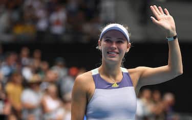 enmark's Caroline Wozniacki waves to the crowd after her defeat against Tunisia's Ons Jabeur their women's singles match on day five of the Australian Open tennis tournament in Melbourne on January 24, 2020. (Photo by Greg Wood / AFP) / IMAGE RESTRICTED TO EDITORIAL USE - STRICTLY NO COMMERCIAL USE (Photo by GREG WOOD/AFP via Getty Images)