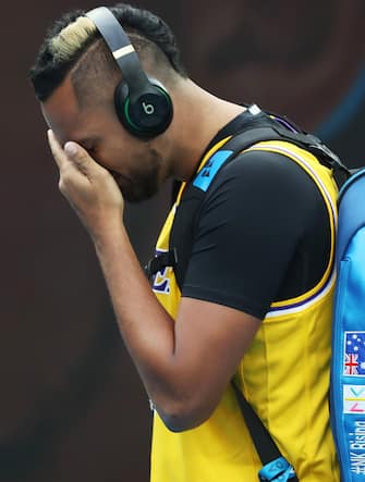 MELBOURNE, AUSTRALIA - JANUARY 27: Nick Kyrgios of Australia walks onto Rod Laver Arena wearing a number 8 Kobe Bryant Jersey ahead of his Men's Singles fourth round match against Rafael Nadal of Spain on day eight of the 2020 Australian Open at Melbourne Park on January 27, 2020 in Melbourne, Australia. (Photo by Mark Kolbe/Getty Images)