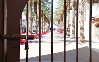 1211417177 INDIAN WELLS, CALIFORNIA - MARCH 09: The Gates remain closed at the front entrance to the Indian Wells Tennis Garden on March 09, 2020 in Indian Wells, California. The BNP Paribas Open was cancelled by the Riverside County Public Health Department, as county officials declared a public health emergency when a case of coronavirus (COVID-19) was confirmed in the area. (Photo by Al Bello/Getty Images)
