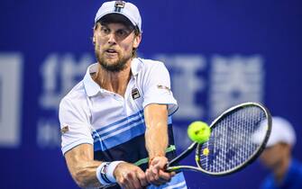 Andreas Seppi of Italy hits a return against Roberto Bautista Agut of Spain during their men's singles quarter-final match at the Zhuhai Championships tennis tournament in Zhuhai in China's southern Guangdong province on September 27, 2019. (Photo by STR / AFP) / China OUT        (Photo credit should read STR/AFP via Getty Images)