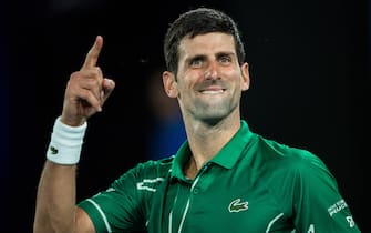 MELBOURNE, AUSTRALIA - JANUARY 30: Novak Djokovic of Serbia celebrates his victory in his semi final match against Roger Federer of Switzerland on day eleven of the 2020 Australian Open at Melbourne Park on January 30, 2020 in Melbourne, Australia. (Photo by Chaz Niell/Getty Images)