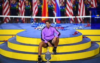 TOPSHOT - Rafael Nadal of Spain pose with the trophy after his win over Daniil Medvedev of Russia during the men's Singles Finals match at the 2019 US Open at the USTA Billie Jean King National Tennis Center in New York on September 8, 2019. - Rafael Nadal captured his 19th career Grand Slam title in thrilling fashion on Sunday by winning the US Open final, outlasting Russia's Daniil Medvedev 7-5, 6-3, 5-7, 4-6, 6-4 to seize his fourth crown in New York. (Photo by Johannes EISELE / AFP)        (Photo credit should read JOHANNES EISELE/AFP via Getty Images)