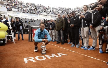 Rafael Nadal of Spain poses for photographers after winning against Novak Djokovic of Serbia during their ATP Masters tournament final tennis match at the Foro Italico in Rome on May 19, 2019. (Photo by Filippo MONTEFORTE / AFP)        (Photo credit should read FILIPPO MONTEFORTE/AFP via Getty Images)