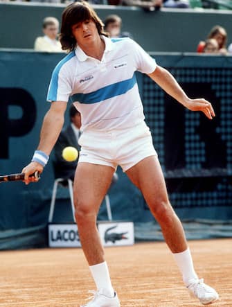 Italian tennis player Adriano Panatta prepares a forehand in a match in june 1982 during French tennis Open at Roland Garros Stadium. (Photo by - / AFP) (Photo by -/AFP via Getty Images)