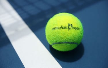 MELBOURNE, AUSTRALIA - JANUARY 11:  An Australian Open branded tennis ball is seen on court ahead of the 2015 Australian Open at Melbourne Park on January 11, 2015 in Melbourne, Australia.  (Photo by Graham Denholm/Getty Images)