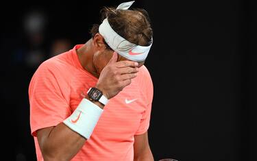 epa09008791 Rafael Nadal of Spain reacts during his men's singles third round match against Cameron Norrie of Britain at the Australian Open Grand Slam tennis tournament at Melbourne Park in Melbourne, Australia, 13 February 2021.  EPA/DEAN LEWINS  AUSTRALIA AND NEW ZEALAND OUT