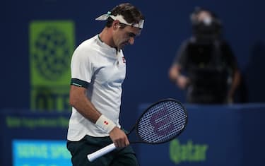 DOHA, QATAR - MARCH 11: Roger Federer of Switzerland reacts during his quarter final loss to Nikoloz Basilashvili of Georgia in the Qatar ExxonMobil Open at Khalifa International Tennis and Squash Complex on March 11, 2021 in Doha, Qatar. (Photo by Mohamed Farag/Getty Images)