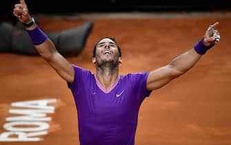 Spain's Rafael Nadal celebrates after defeating Serbia's Novak Djokovic during the final of the Men's Italian Tennis Open at Foro Italico on May 16, 2021 in Rome, Italy. (Photo by Filippo MONTEFORTE / AFP) (Photo by FILIPPO MONTEFORTE/AFP via Getty Images)