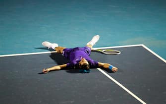 epa09079030 Lorenzo Musetti of Italy celebrates after defeating Diego Schwartzman of Argentina during the second day of the Mexican Tennis Open in Acapulco, Guerrero state, Mexico, 16 March 2021.  EPA/David Guzman