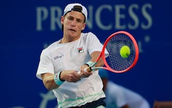 epa09078949 Diego Schwartzman of Argentina in action against Lorenzo Musetti of Italy during the second day of the Mexican Tennis Open in Acapulco, Guerrero state, Mexico, 16 March 2021.  EPA/David Guzman