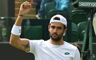 Italy's Matteo Berrettini celebrates after beating Slovenia's Aljaz Bedene during their men's singles third round match on the sixth day of the 2021 Wimbledon Championships at The All England Tennis Club in Wimbledon, southwest London, on July 3, 2021. - RESTRICTED TO EDITORIAL USE (Photo by Glyn KIRK / AFP) / RESTRICTED TO EDITORIAL USE (Photo by GLYN KIRK/AFP via Getty Images)