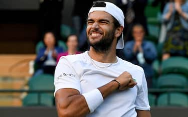 epa09329846 Matteo Berrettini of Italy reacts after winning the men's quarter final match against Felix Auger-Aliassime of Canada at the Wimbledon Championships, in Wimbledon, Britain, 07 July 2021.  EPA/FACUNDO ARRIZABALAGA   EDITORIAL USE ONLY