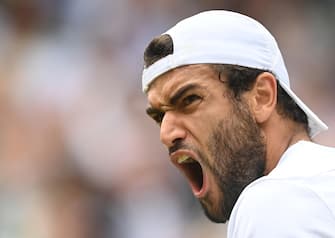 epa09337332 Matteo Berrettini of Italy reacts during the men's final against Novak Djokovic of Serbia  at the Wimbledon Championships, Wimbledon, Britain 11 July 2021.  EPA/NEIL HALL   EDITORIAL USE ONLY