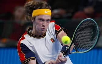 epa09536135 Andrey Rublev of Russia in action during the men's second round match against Adrian Mannarino of France at the Kremlin Cup tennis tournament in Moscow, Russia, 21 October 2021.  EPA/YURI KOCHETKOV