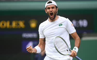 epa09337384 Matteo Berrettini of Italy reacts during the men's final against Novak Djokovic of Serbia  at the Wimbledon Championships, Wimbledon, Britain 11 July 2021.  EPA/NEIL HALL   EDITORIAL USE ONLY