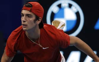 Lorenzo Musetti of Italy  returns the ball during the match against Sebastian Baez of Argentina  on the  first day of the Next Gen Atp Finals in Milan, Italy, 09 November 2021. The Next Gen Atp Finals runs from 09 November through 13 NovemberANSA / MATTEO BAZZI