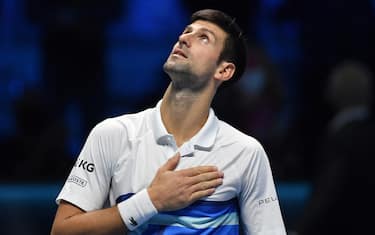 Serbia's Novak Djokovic celebrates after winning to Norway's Casper Ruud during their single match of ATP Finals' first round at the Pala Alpitour venue in Turin on November 15, 2021. (Photo by Marco BERTORELLO / AFP) (Photo by MARCO BERTORELLO/AFP via Getty Images)