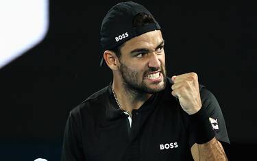 MELBOURNE, AUSTRALIA - JANUARY 23: Matteo Berrettini of Italy celebrates a point in his fourth round singles match against Pablo Carreno Busta of Spain during day seven of the 2022 Australian Open at Melbourne Park on January 23, 2022 in Melbourne, Australia. (Photo by Cameron Spencer/Getty Images)