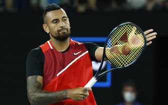 MELBOURNE, AUSTRALIA - JANUARY 29: Nick Kyrgios of Australia reacts in his Men's Doubles Final match with Thanasi Kokkinakis of Australia Matthew Ebden of Australia and Max Purcell of Australia against during day 13 of the 2022 Australian Open at Melbourne Park on January 29, 2022 in Melbourne, Australia. (Photo by Darrian Traynor/Getty Images)
